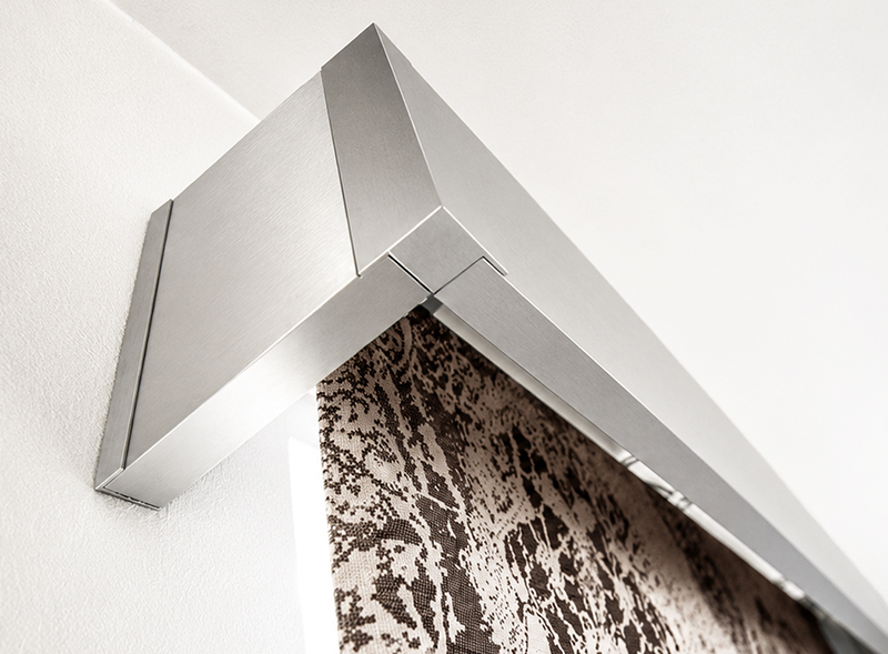 Decorquip Roman blind with brushed silver Capital Fascia in an interior setting