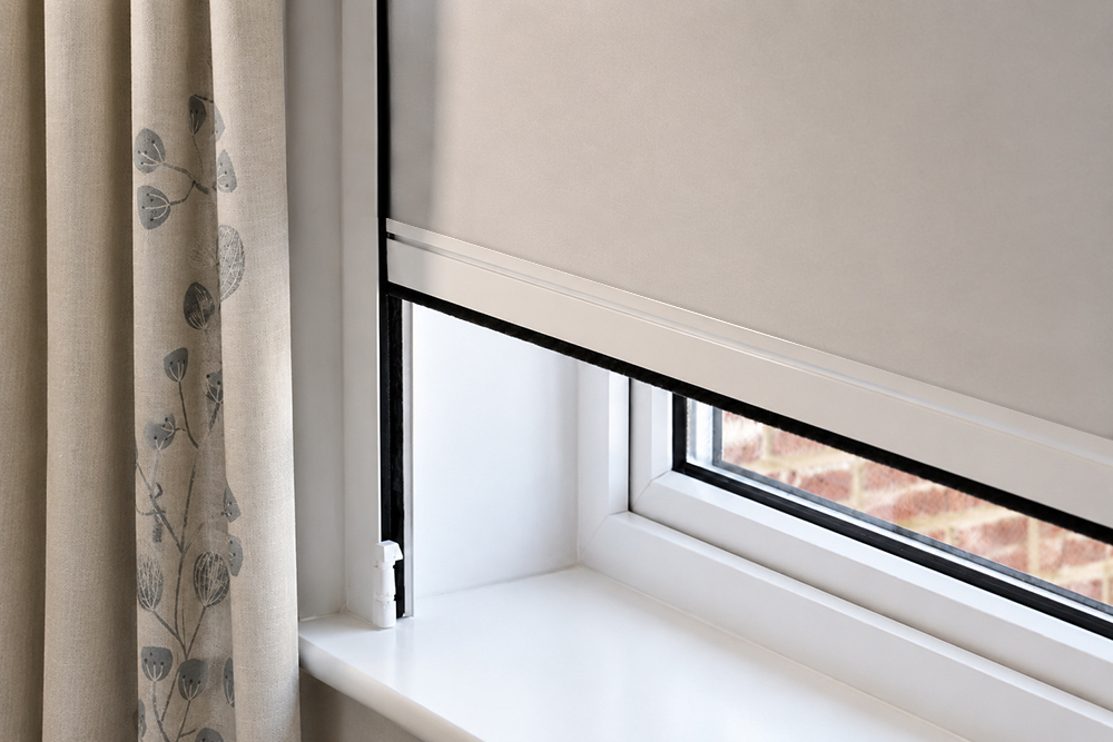 White Hardware Cassetted Roller Blind in a window, Decorquip
